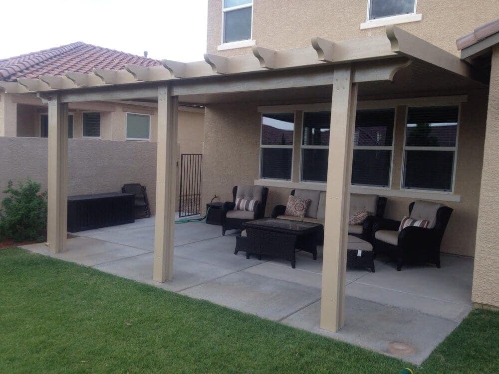 Solid patio cover over an outdoor dining set
