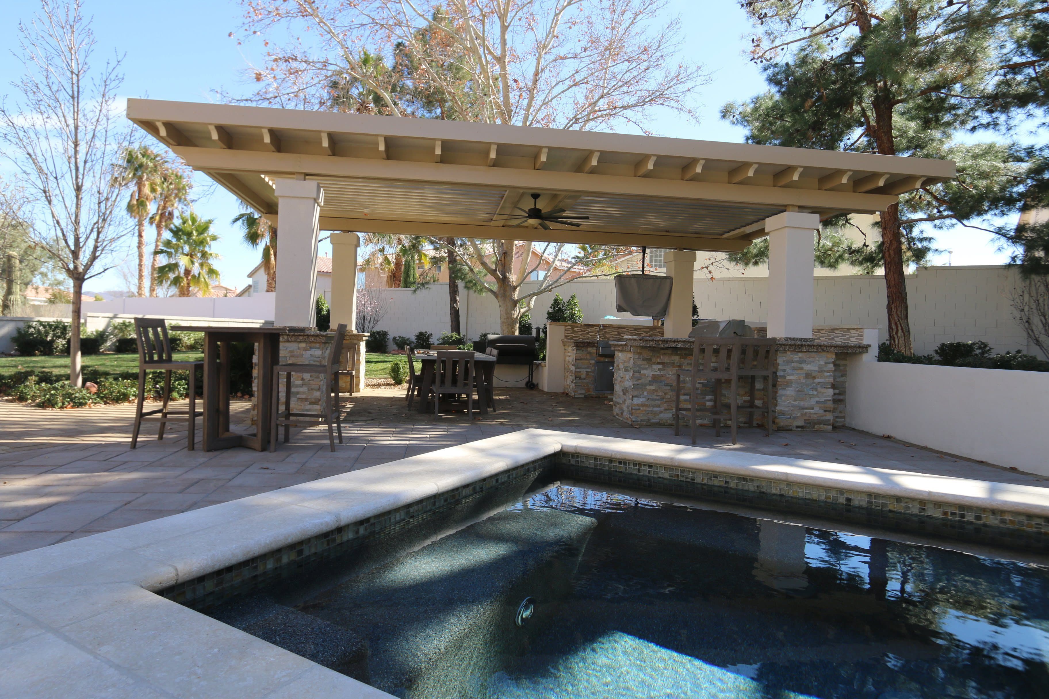 Equinox louvered roof over a pool deck