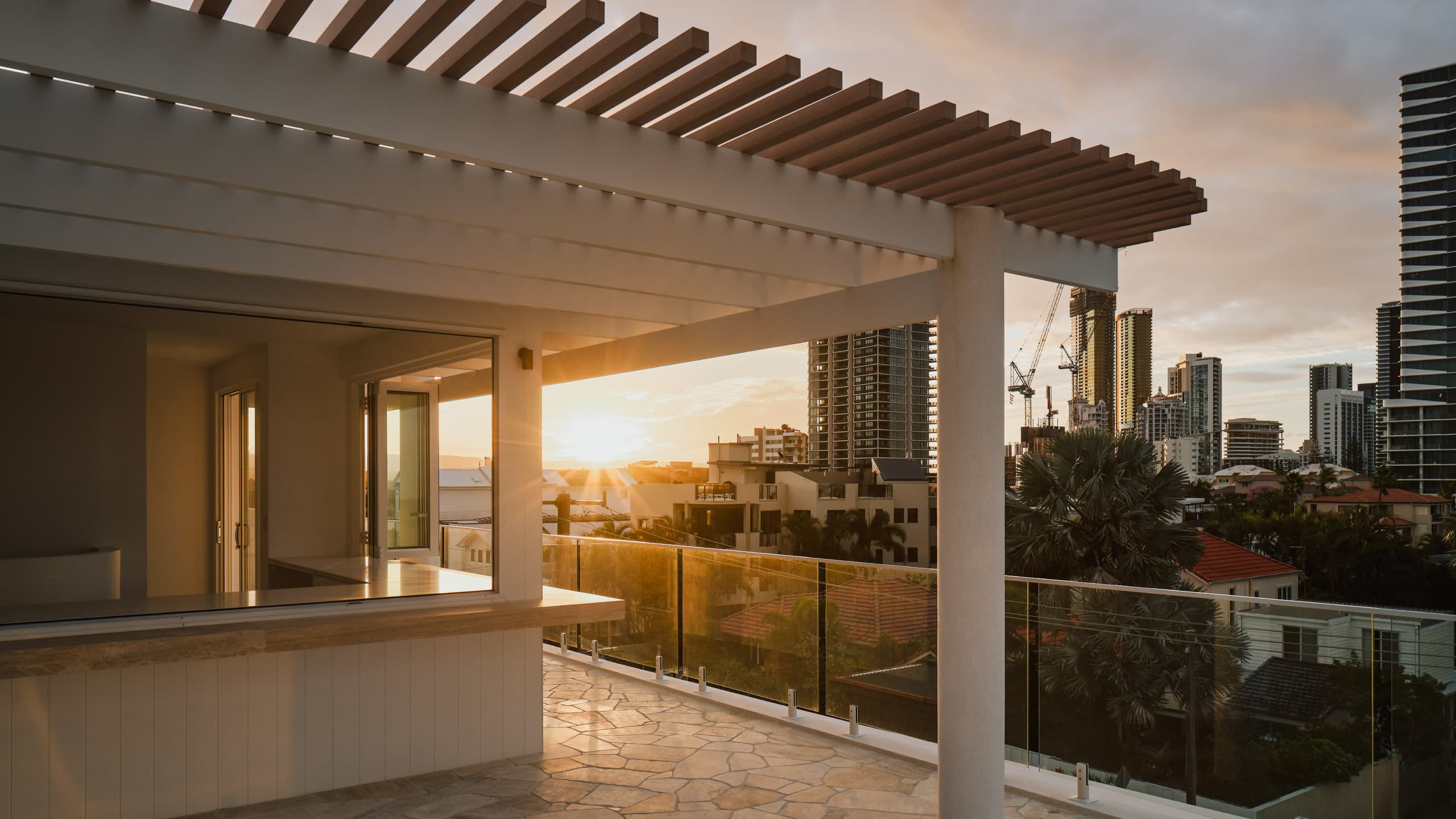 Knotwood wood-look aluminum pergola at sunset